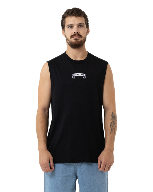 Man wearing a black sleeveless shirt with a logo on a white background