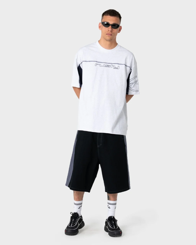 Rusty Lock 'Em 24" Cotton Canvas Shorts in black on model in white rusty tee