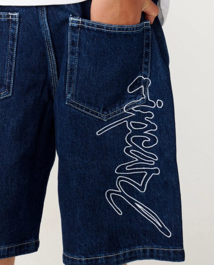 Rip Curl Boys Script 22" Denim Shorts in true indigo colourway showing rear embroidery