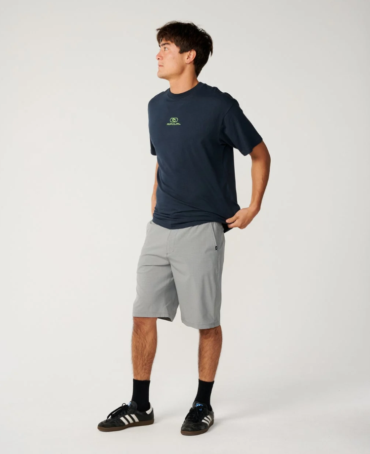 Rip Curl Boardwalk Phase 22" Shorts in steel grey on model in navy Rip Curl tee
