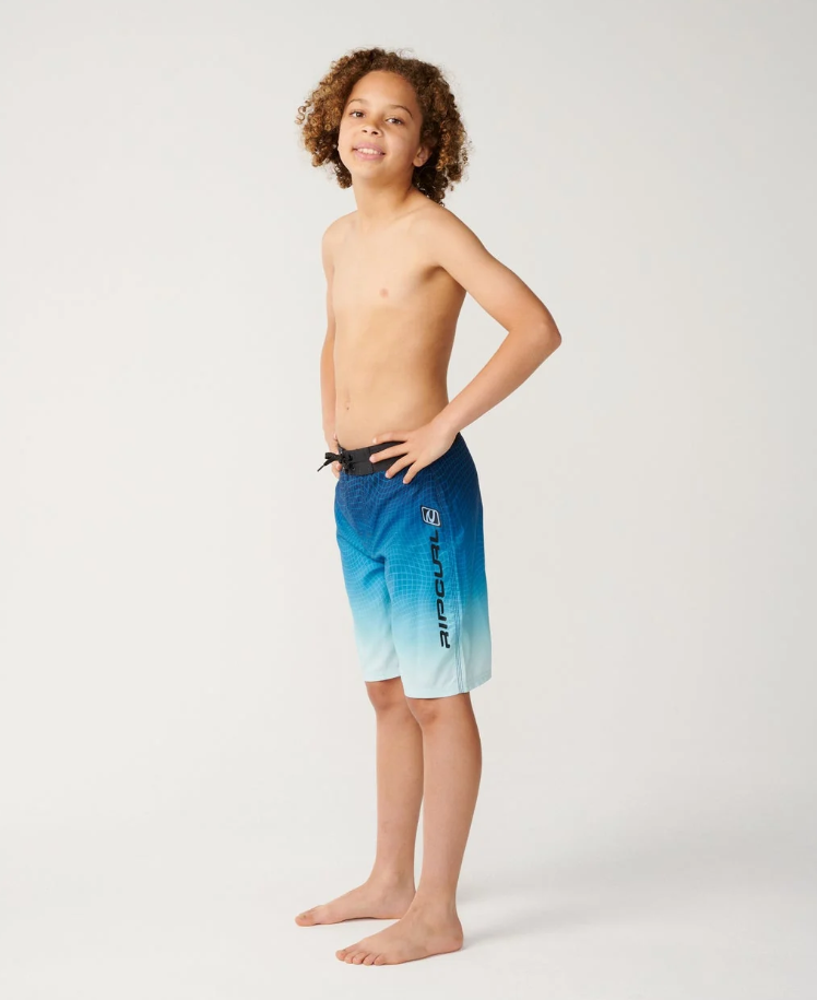 Rip Curl Shockwave Boys 18" Boardshorts in blue fade on model from the side