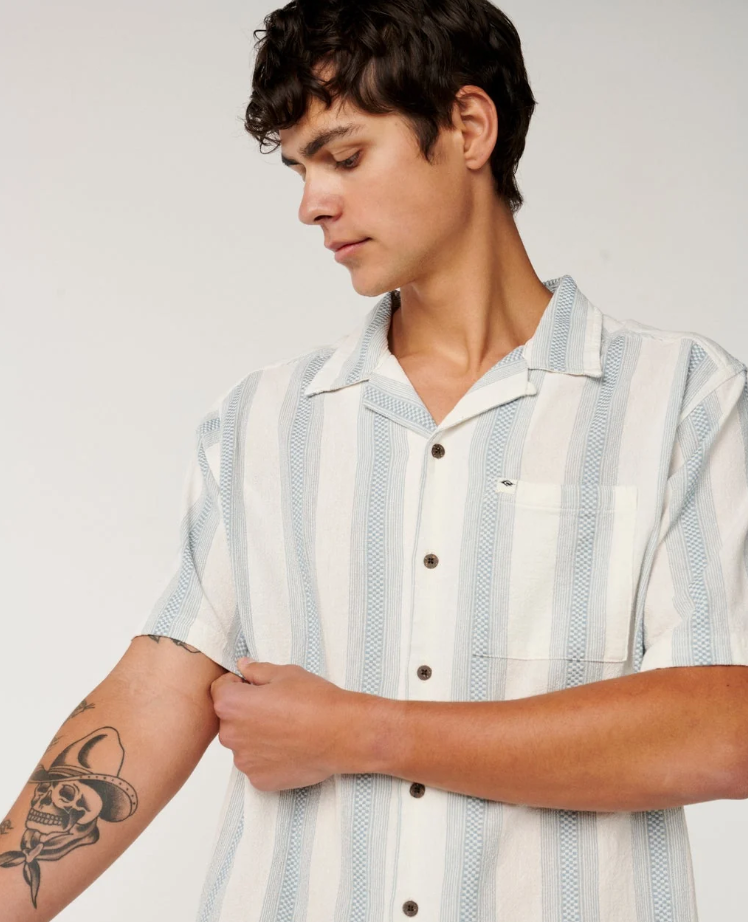 Rip Curl Classic Surf Weaver Short Sleeve Shirt in bone colourway with light blue vertical stripes close up from front