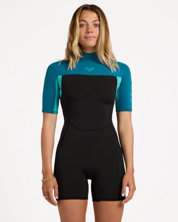 Roxy Prologue 2mm Spring Womens Wetsuit in baltic colourway with black body on model from the front close up