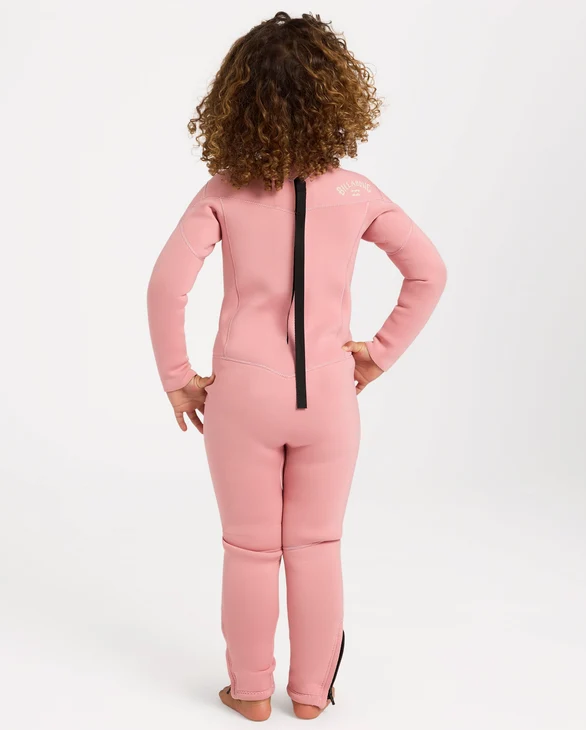 Billabong Absolute 3/2mm Flatlocked Girls Toddler Wetsuit in french rose pink colourway on a model from the back