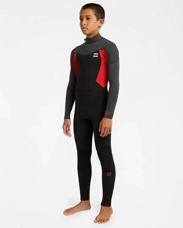 Billabong Absolute 3/2mm Flatlocked Boys Wetsuit in black, grey and red on model from the side