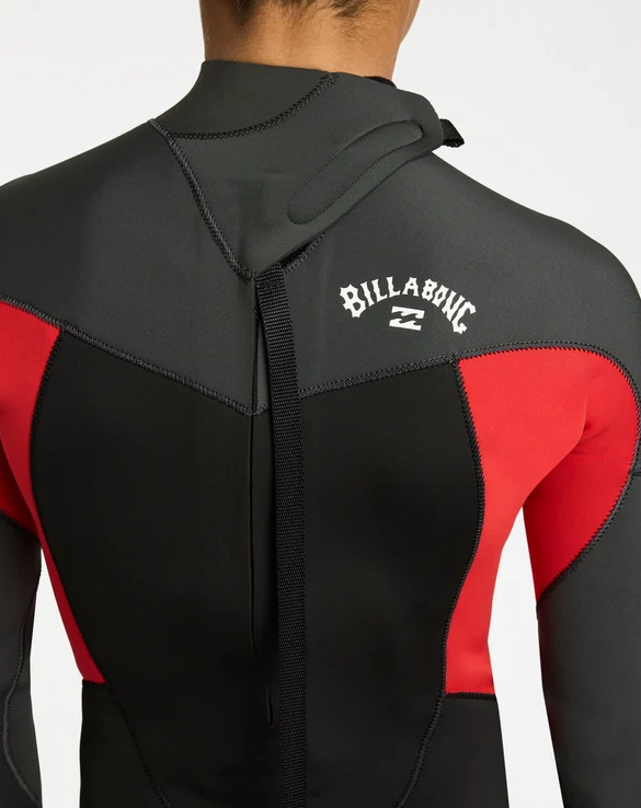 Billabong Absolute 3/2mm Flatlocked  Boys Wetsuit in black, grey and red on model from the rear close up of the zip
