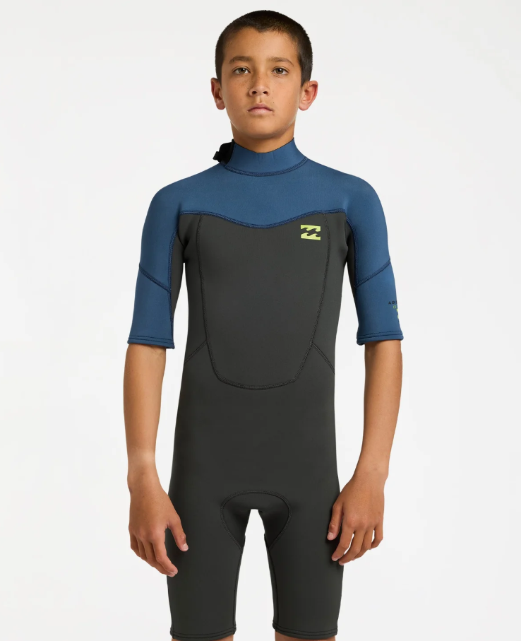 BIllabong Absolute 2mm Boys Spring Wetsuit in black with blue arms from the front