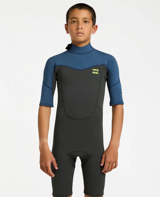 BIllabong Absolute 2mm Boys Spring Wetsuit in black with blue arms from the front
