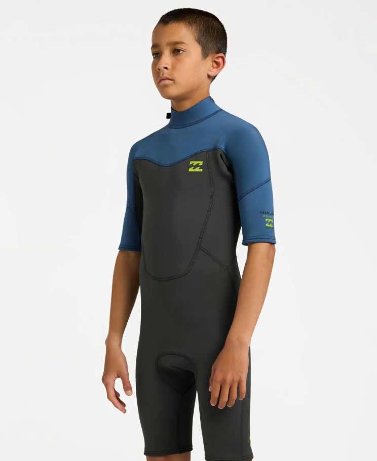 BIllabong Absolute 2mm Boys Spring Wetsuit in black with blue arms from the side