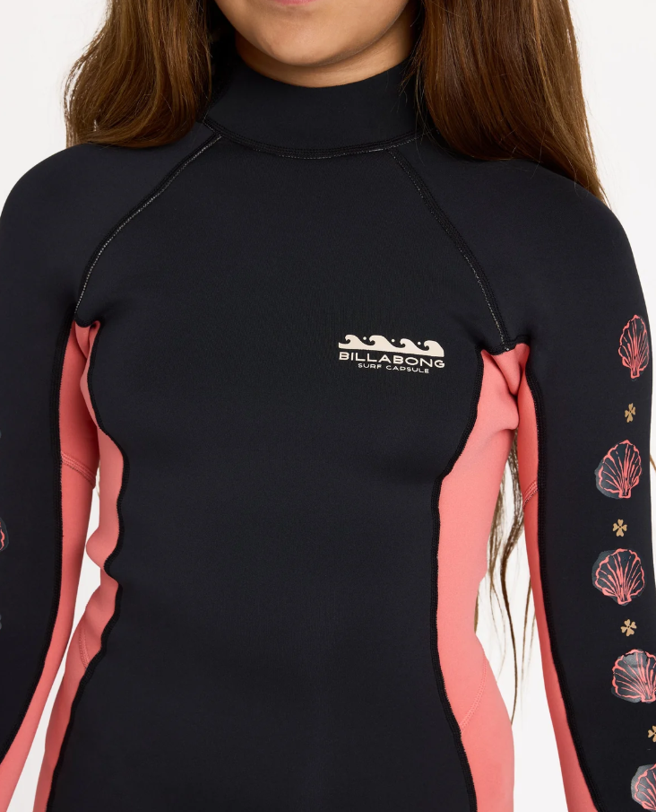Billabong Teen Spring Fever 2mm Long Sleeve Wetsuit in black with watermelon on model from the front close up