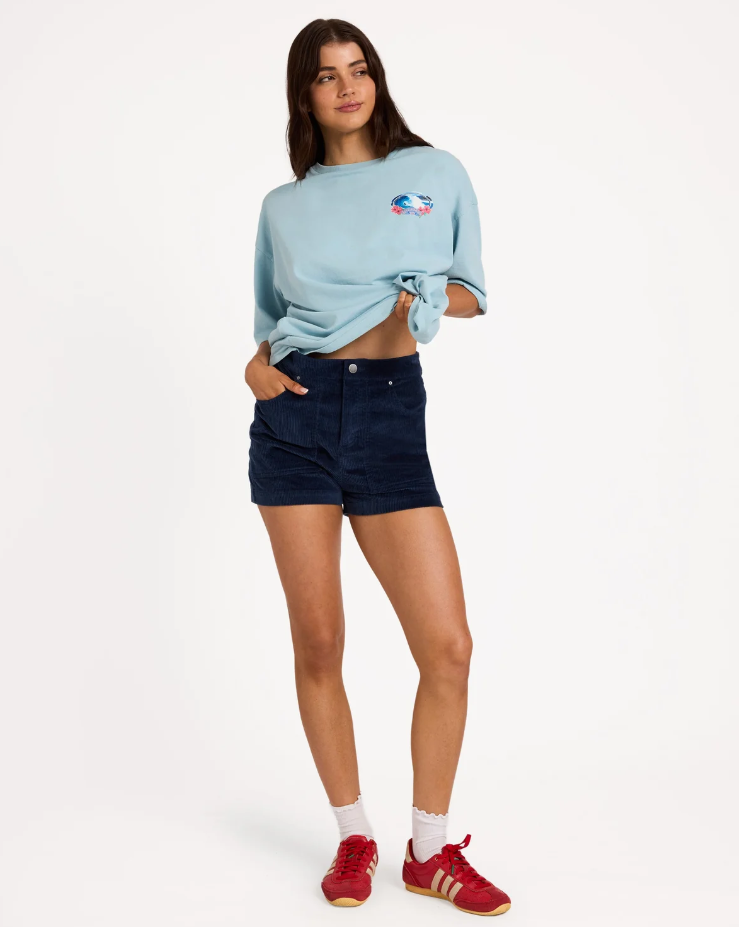 Billabong Good Era Corduroy Shorts in dark blue from front on model in light blue tee