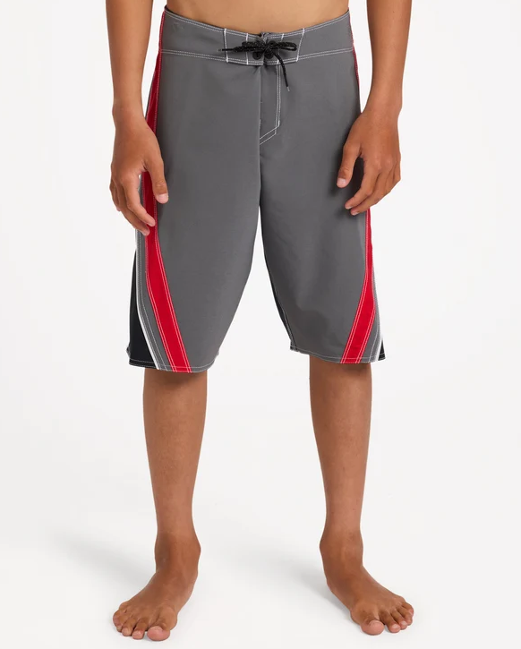 Billabong Boys Fluid 2K 19" Boardshorts in grey with red and black detail on model from the front