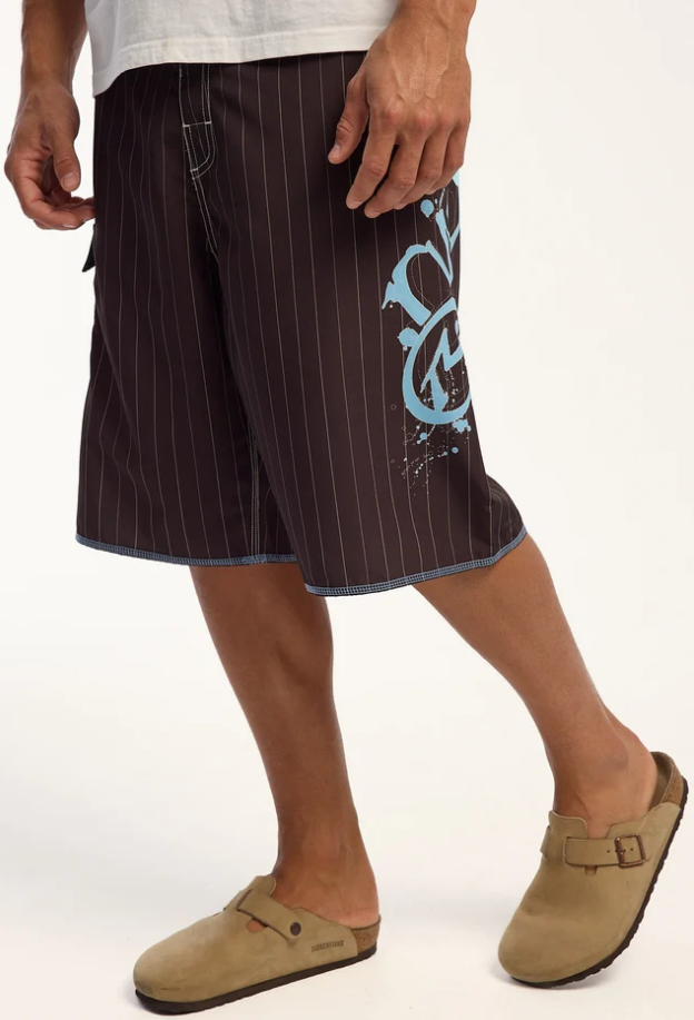 Rusty Scribbla 24" Fixed Waist Boardshorts in java brown with pin stripes on model close up from left side