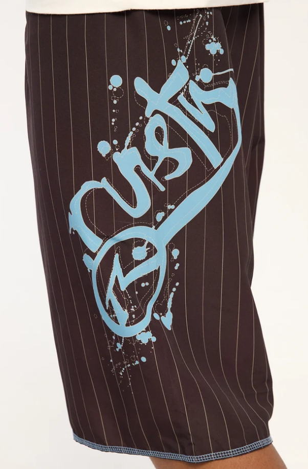 Rusty Scribbla 24" Fixed Waist Boardshorts in java brown with pin stripes from left side showing blue Rusty print
