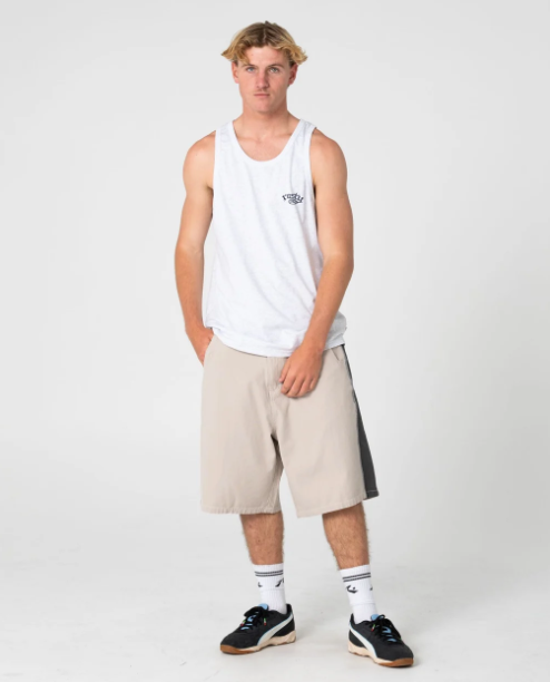 Rusty Smacko Tank Top in ecru marle on model from the front in long walkshorts