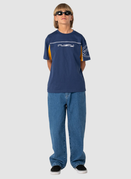 Rusty Boys Cyber Short Sleeve Tee in navy on boy in blue jeans from the front
