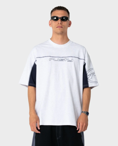 Rusty Cyber Wave Men's T-Shirt in ecru marle on model from the front in black walkshorts