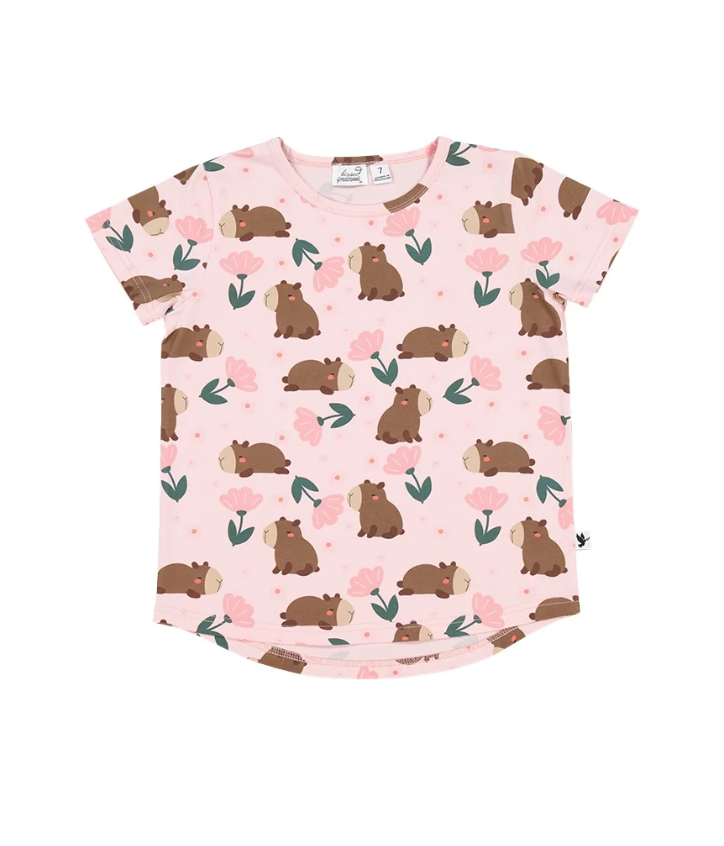 Kissed By Radicool Floral Capybaras Girls Tee in pink from the front