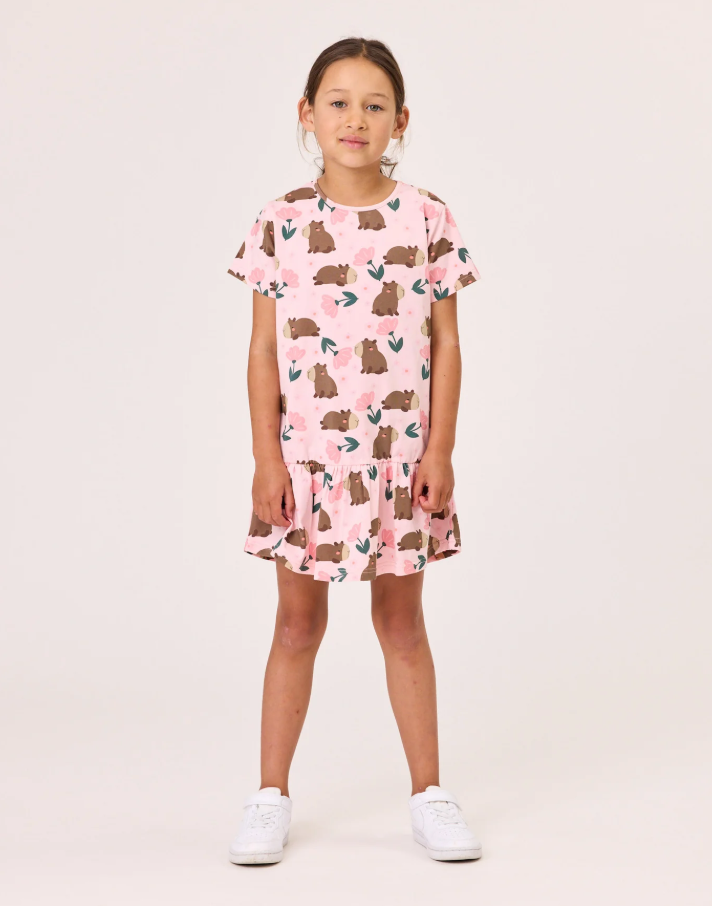 Kissed By Radicool Floral Capybaras Frill Dress in pink on girl from the front