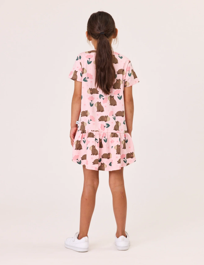 Kissed By Radicool Floral Capybaras Frill Dress in pink on girl from the back