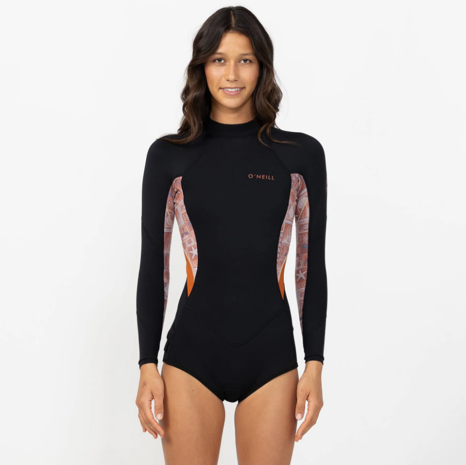 O'Neill Bahia 2mm Mid Long Sleeve Women's Wetsuit in black with tangerine side panels on model from front close up