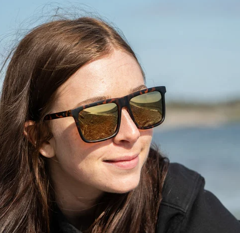 CHPO Brand Bruce Sunglasses in turtle brown on female model from the front outside