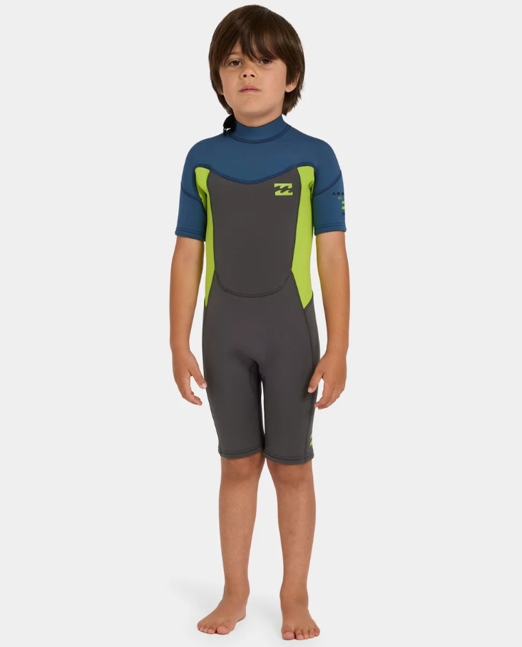 Billabong Absolute 2mm Springsuit Toddler Wetsuit in charcoal, navy and flouro lime on kid from the front