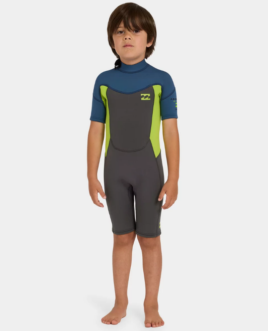Billabong Absolute 2mm Springsuit Toddler Wetsuit in charcoal, navy and flouro lime on kid from the front