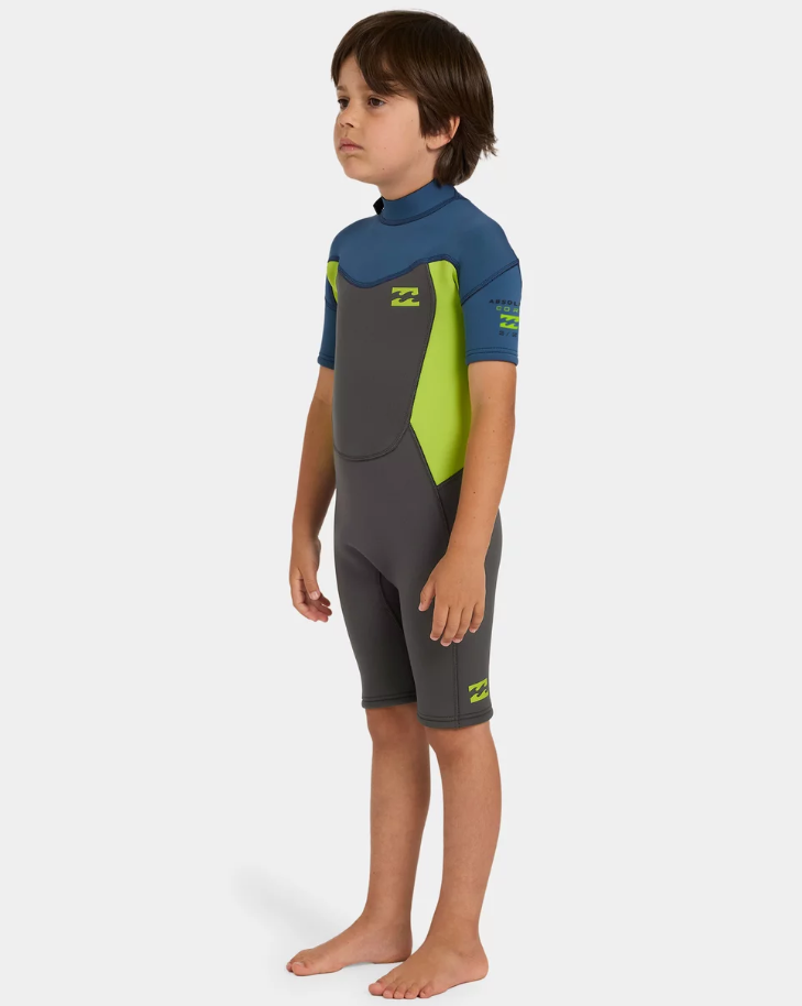 Billabong Absolute 2mm Springsuit Toddler Wetsuit in charcoal, navy and flouro lime on kid from the side