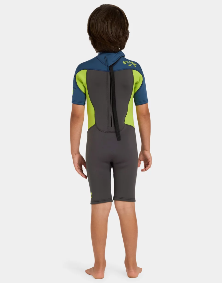 Billabong Absolute 2mm Springsuit Toddler Wetsuit in charcoal, navy and flouro lime on kid from the back