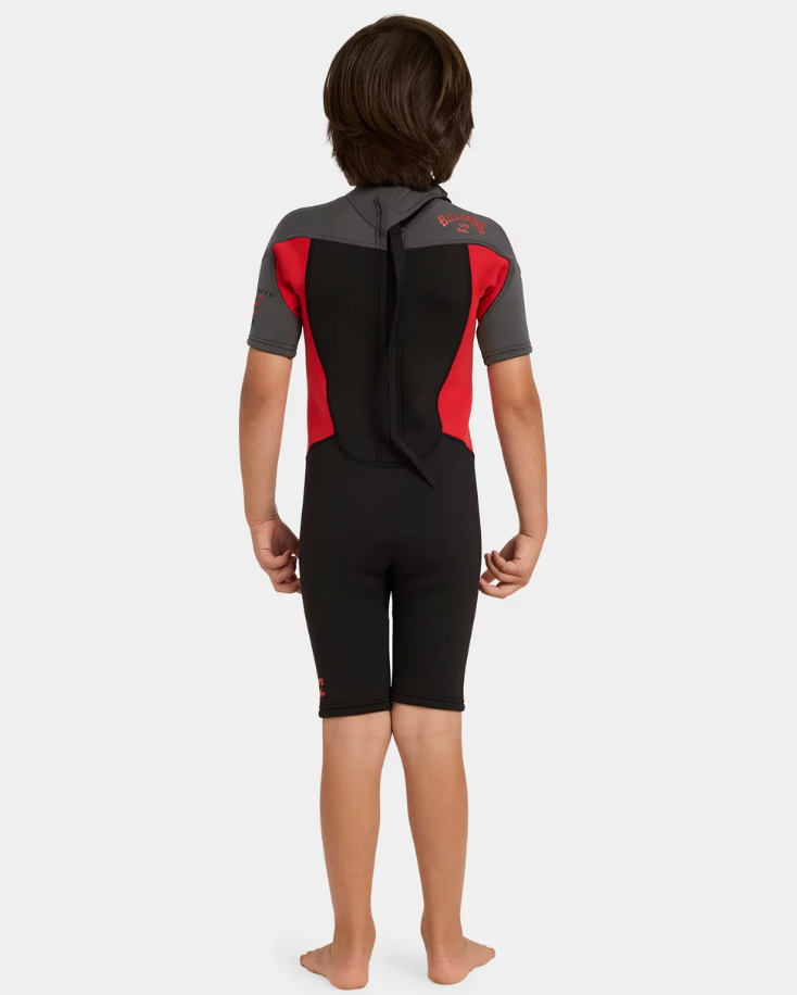 Billabong Absolute 2mm Springsuit Toddler Wetsuit in black, grey and red on kid from the back