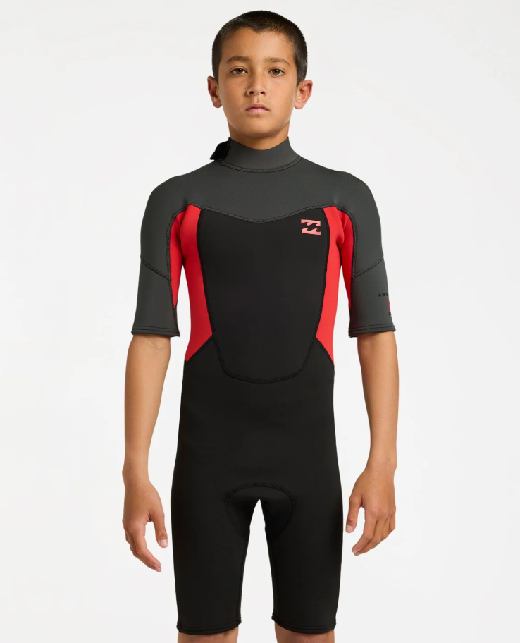 BIllabong Absolute 2mm Boys Spring Wetsuit in black with red and grey from the front