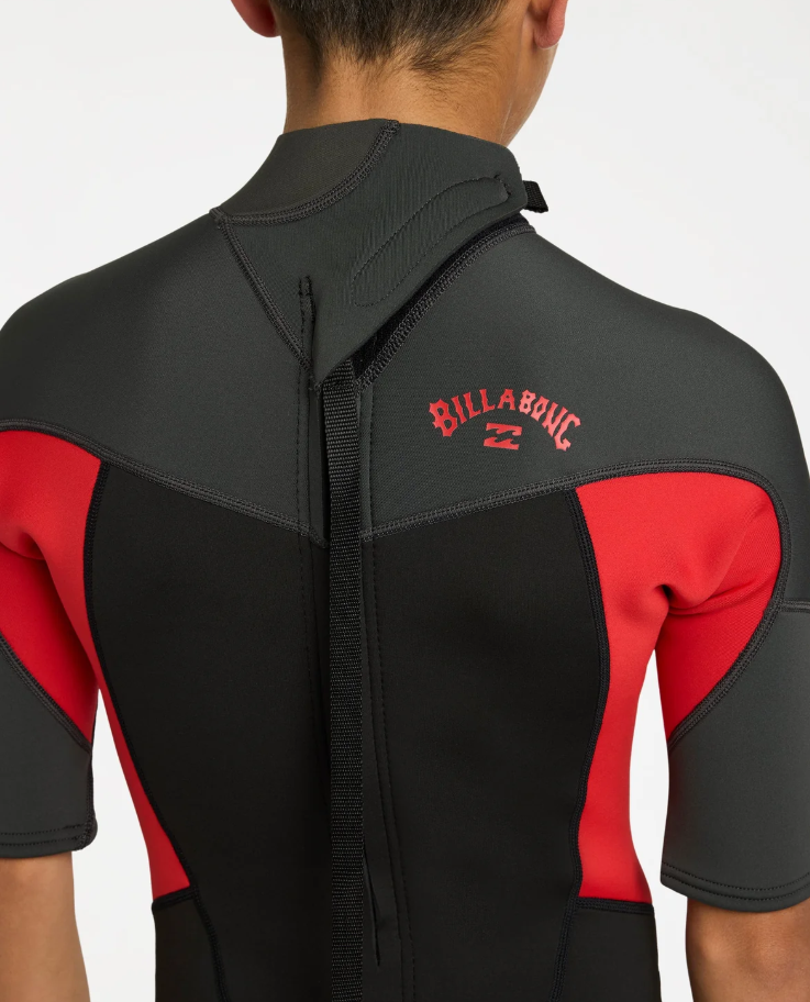 BIllabong Absolute 2mm Boys Spring Wetsuit in black with grey and red from the rear 