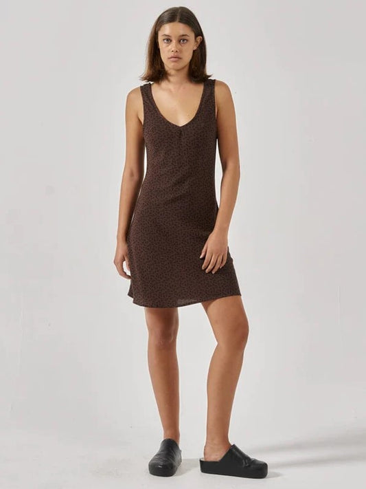 Thrills Cassia Mini Dress in black colourway presenting as brown on a model from the front
