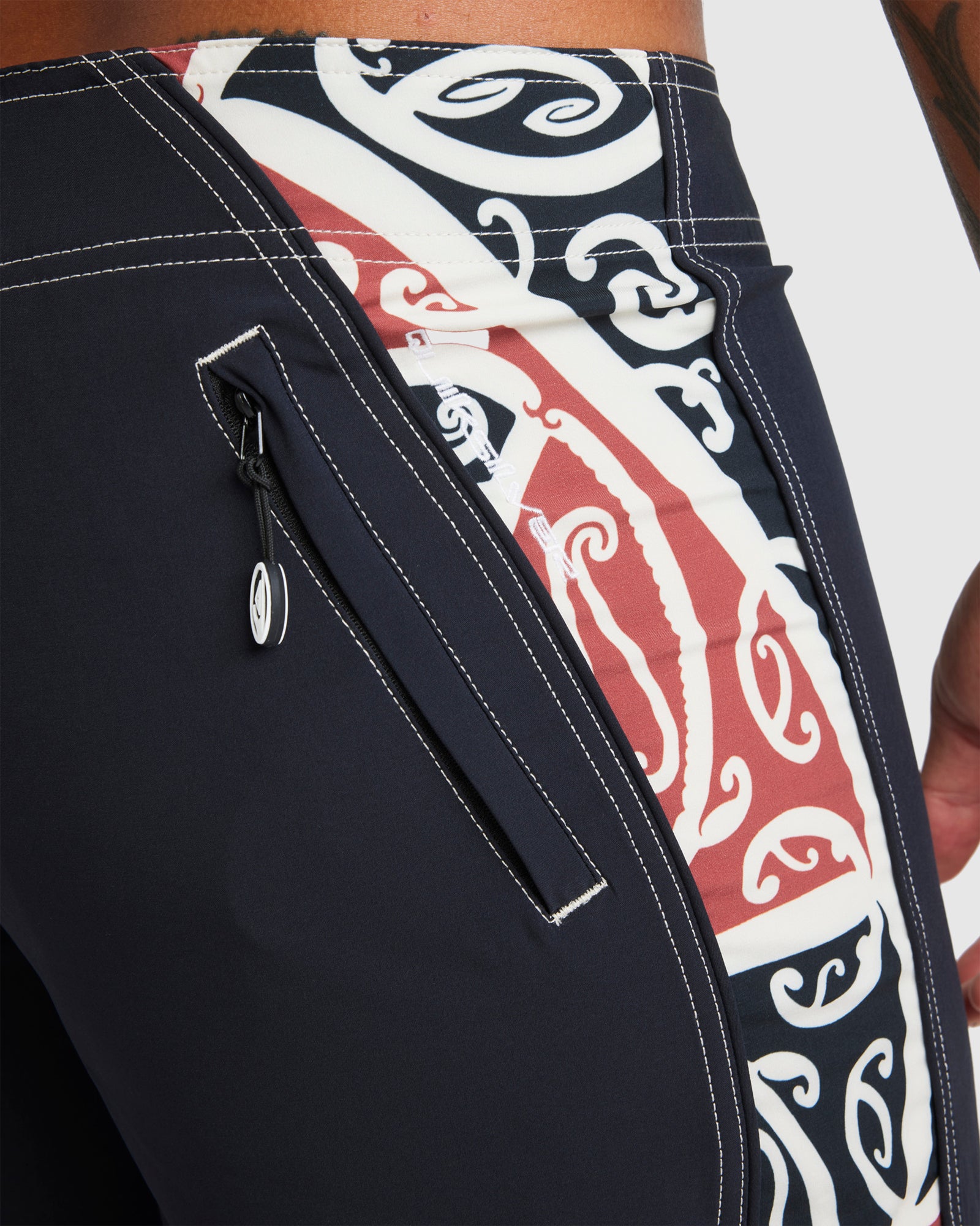 Quiksilver Kowhaiwhai Mangopare Boardshorts close up in black showing maori panel on side