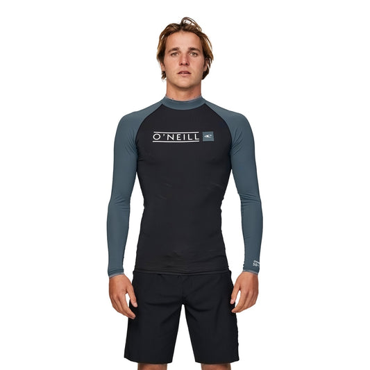 O'Neill Reactor Block UV Long Sleeve Rash Top in black with orion blue arms on model from front