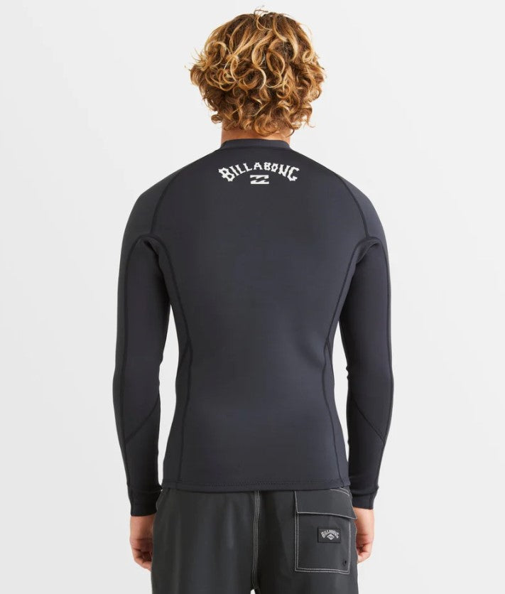 Billabong Absolute Natural 1mm Long Sleeve Wetsuit Top in black on model from rear