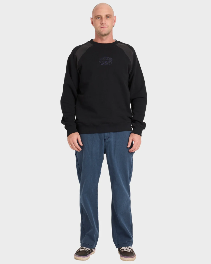 Billabong Bad Dog Men's Crew in black on model in blue jeans from front