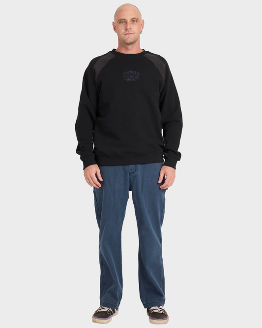 Billabong Bad Dog Men's Crew in black on model in blue jeans from front