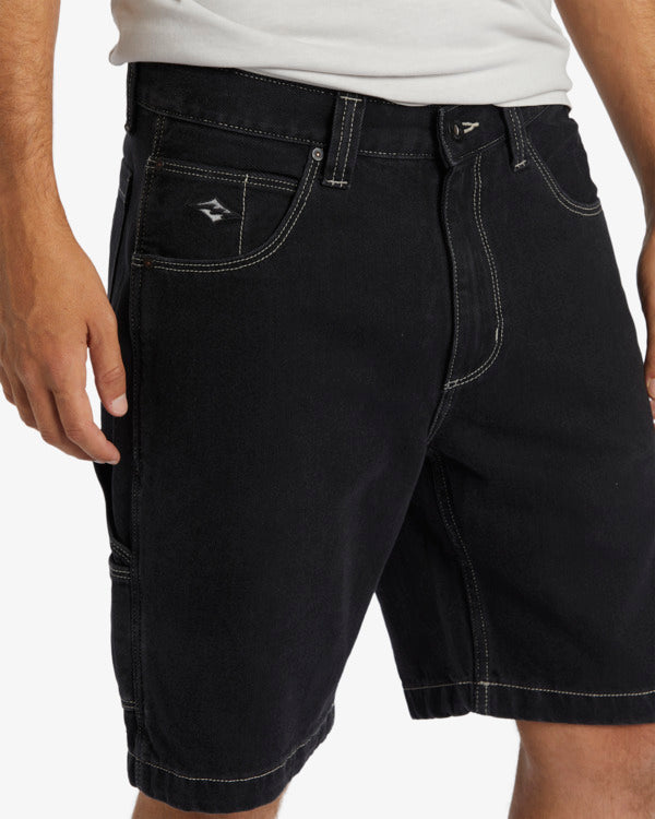 Billabong Bad Dog Workwear Immortal Denim Shorts in black from front/side view