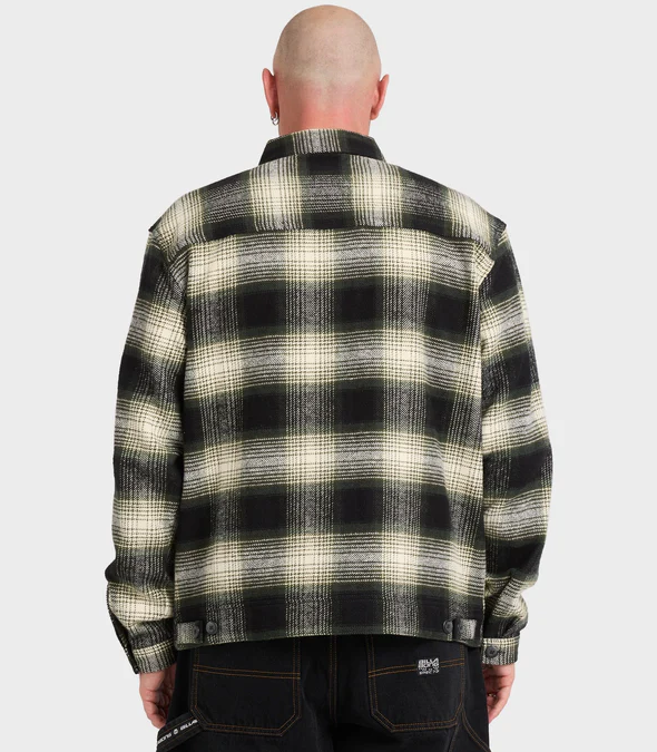 Billabong Bad Dog Jacket in black on model in black jeans from rear