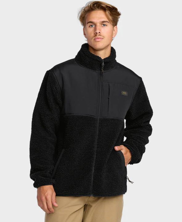 Billabong Boundary Summit Mock Neck Zip Crew Jacket in black from front on model