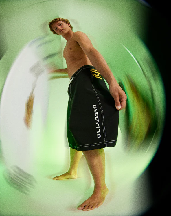 Billabong Bracket Pro 21" Men's Boardshorts in black on model with fish eye effect