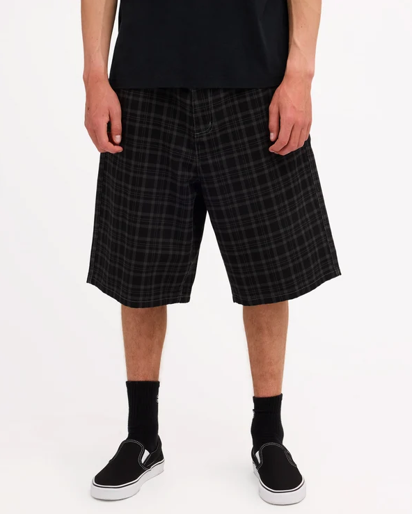 Billabong Cando Star 23" Men's Walkshorts in black on model from the front close up