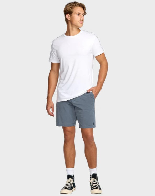 Billabong Crossfire Wave Wash Submersible Shorts in midnight blue on model in white tee