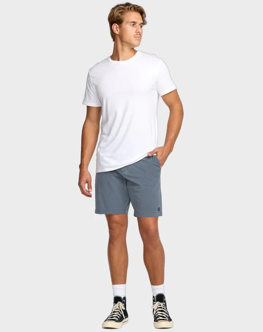 Billabong Crossfire Wave Wash Submersible Shorts in midnight blue on model in white tee