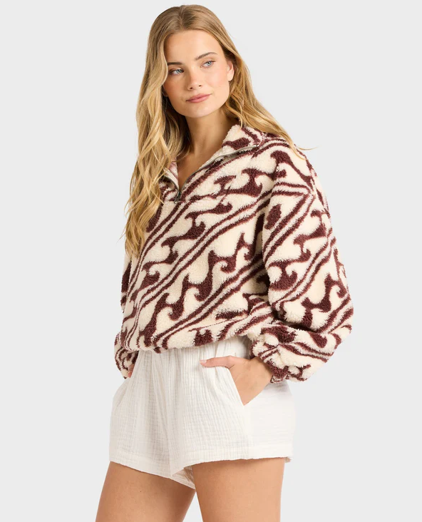 Billabong Dark Wave Half Zip Crew Fleece in teak colourway on model from side
