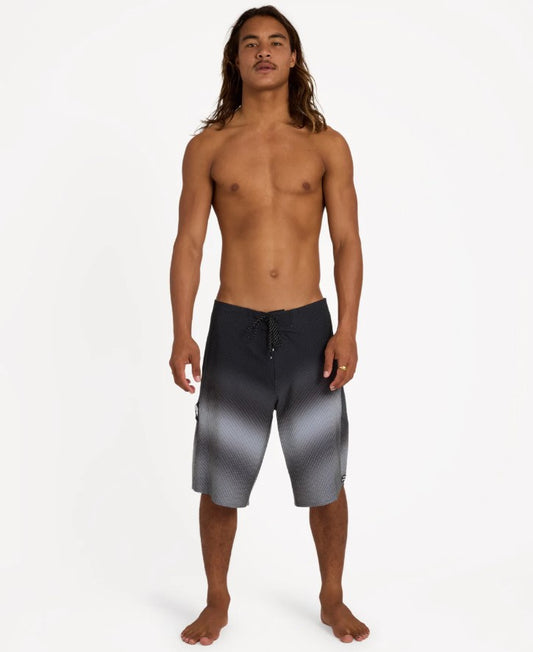 Billabong Fluid Pro 21" Boardshorts in black fade on model from front