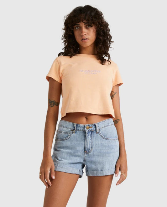Billabong Frankie 2" Women's Denim Shorts in water blue on model wearing apricot colour tee from front