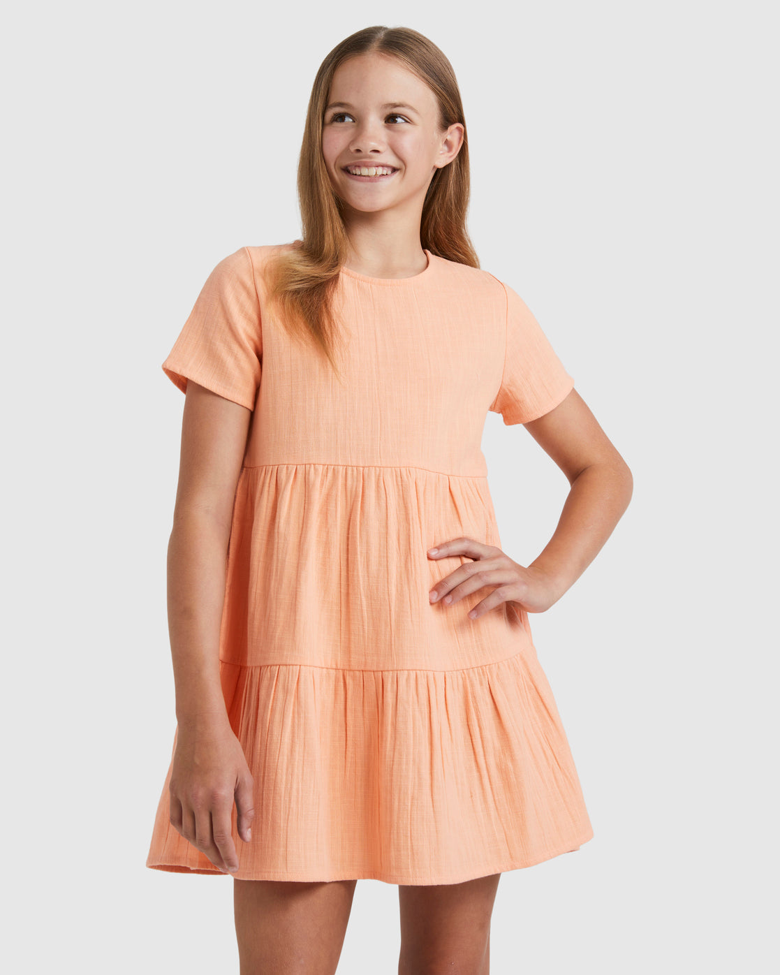 Billabong Girls Gigi Dress in peach colour on model